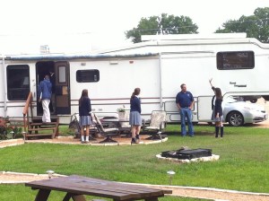 Students analyzing the RV that they will design an awning for